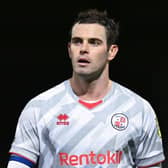 Crawley Town skipper Dion Conroy hobbled off against Lincoln City on Tuesday night. (Photo by Michael Regan/Getty Images)