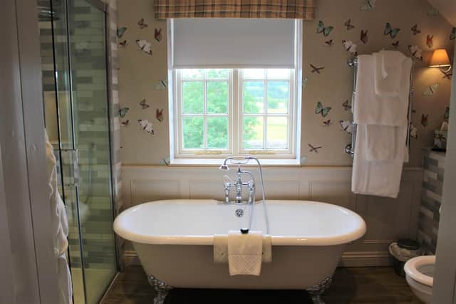The roll top bath inside dog-friendly 'Phaeton', one of four rooms in The Coach House. Image: Devonshire Hotels