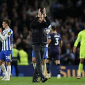 BRIGHTON, ENGLAND - OCTOBER 23: Graham Potter, Manager of Brighton & Hove Albion applauds fans after his sides defeat in the Premier League match between Brighton & Hove Albion and Manchester City at American Express Community Stadium on October 23, 2021 in Brighton, England. (Photo by Steve Bardens/Getty Images)