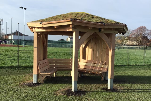 The hexagonal structure by Handspring Design features a living green roof with skylight, protective side windbreaks and seating for up to 10 people