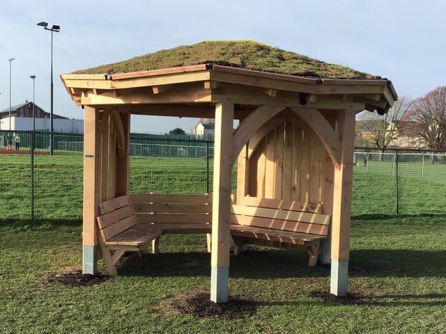 The hexagonal structure by Handspring Design features a living green roof with skylight, protective side windbreaks and seating for up to 10 people