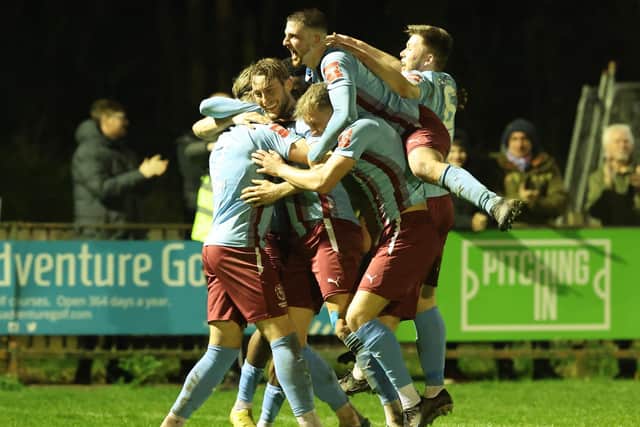 United's players celebrate Tommie Fagg's late goal, which proved the winner | Picture: Scott White