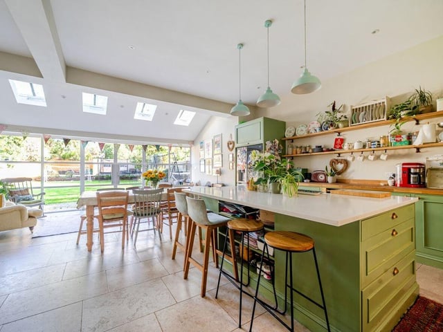 The extended open-plan kitchen / family room is a wonderful feature of the home