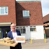 Leader of Burgess Hill Town Council Robert Eggleston pictured with a model of the Beehive outside the former RBL building last year