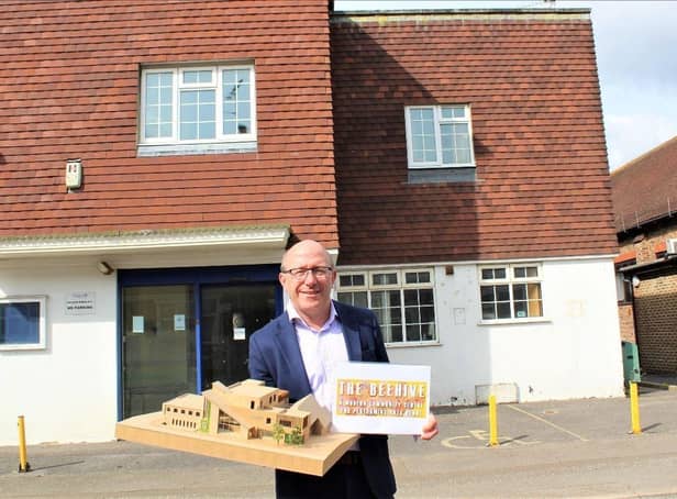 Leader of Burgess Hill Town Council Robert Eggleston pictured with a model of the Beehive outside the former RBL building last year