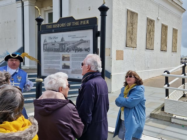 Worthing town crier Bob Smytherman launched his new walk on Tuesday, April 2, followed by afternoon tea at Worthing Town Hall to raise money for the mayor's charities, Broadwater Support Group and Community Hub, CYCALL inclusive cycling and the Parkinson's UK Worthing and Washington Group. Using information provided by The Worthing Society, Bob led a group of around 20 people on a three-hour walk around the town centre and seafront, giving many stories of the area's history en route.