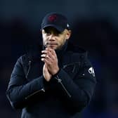 Vincent Kompany, Manager of Burnley, applauds the fans after the Premier League match between Brighton & Hove Albion and Burnley FC at American Express Community Stadium on December 09, 2023 in Brighton, England. (Photo by Bryn Lennon/Getty Images)
