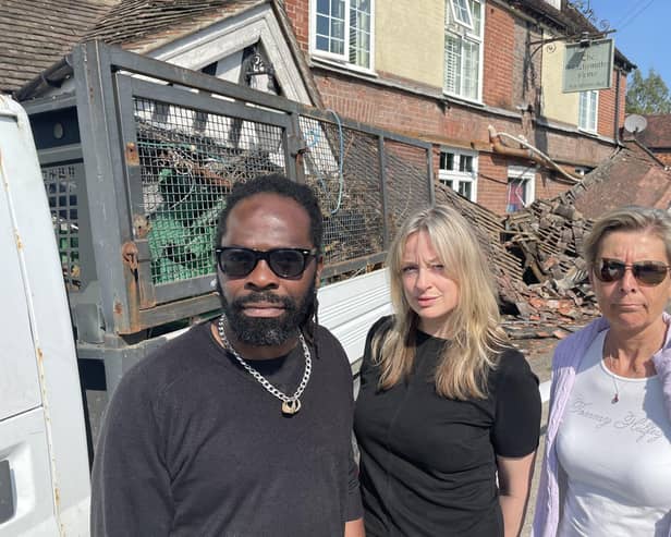 Green Party Councillors Lucy Agace and Joa Saunders with Jazz Benjamin, Landlord of the Blacksmith Arms, Offham outside the Blacksmith Arms.
