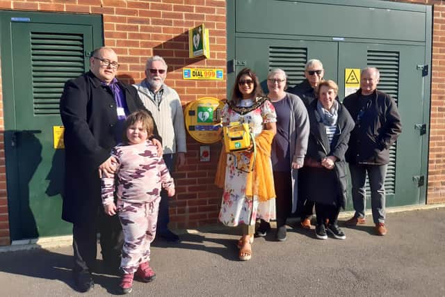 Worthing mayor Henna Chowdhury with New West Durrington Residents Association members, launching the estate's new defibrillator