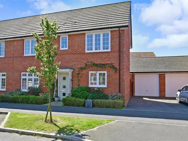 Three bed semi-detached house with two baths and one reception - £264,000.