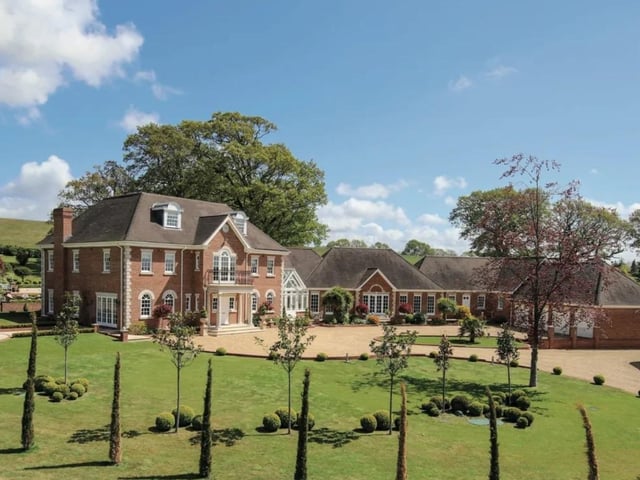 This property is on the market with Sotheby's International Realty - Cobham for a guide price of £8,500,000.
Alongside the 11 beds, 11 baths, and six receptions it has an indoor and an outdoor pool, gym and detached two bedroom guest bungalow.
