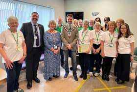 QVH Macmillan Centre team with members of the senior team at QVH and the local Mayor