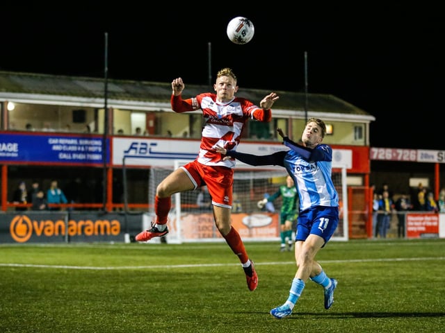 Action from Eastbourne Borough's home defeat by Torquay United in National League South