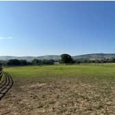 Site of the proposed wellbeing centre in Henfield with views across the South Downs