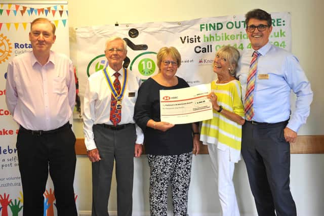 Sue Blunden from Parkinson's UK receives a cheque at Haywards Heath Town Council on Thursday, June 29