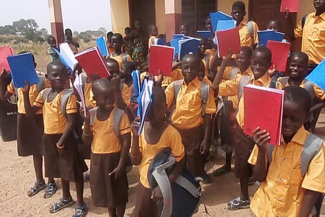 Children at a rural Bawku primary school with their new uniforms and stationery