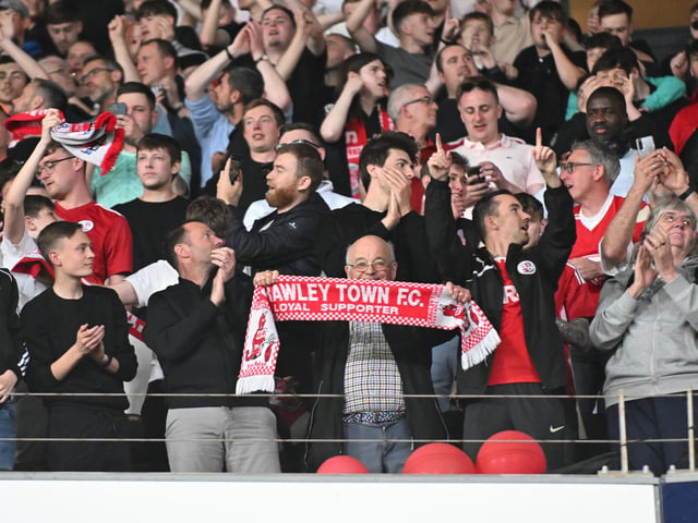 The Crawley Town supporters celebrate during the EFL Sky Bet League 2 play-off second leg match between Milton Keynes Dons and Crawley Town at stadium:mk, Milton Keynes, England on 11 May 2024.:Crawley Town hammered MK Dons 5-1 - and 8-1 on aggregate - to reach the League Two play-off final Wembley. Photographer Dennis Goodwin/Pro Sport Images was there to catch the action, the crowd and the celebrations
