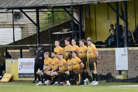 Littlehampton Town's players pose for a team picture last Saturday at the final game they will play in front of the old stand, due to be replaced in the summer | Picture: Stephen Goodger