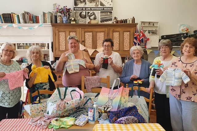 The Crafts and a Cuppa group with some of the items they have made for babies and children. Picture: Georgina Colwell / Submitted