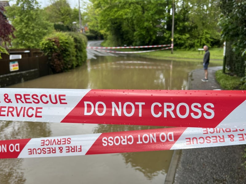 In Pictures: West Sussex road closed following heavy flooding