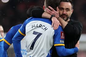 Brighton's Italian head coach Roberto De Zerbi commiserates Brighton's English midfielder Solly March