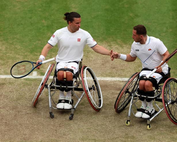 Gordon Reid (L) and Alfie Hewitt (R) of Great Britain in action at Wimbledon in 2023 (Photo by Clive Brunskill/Getty Images)