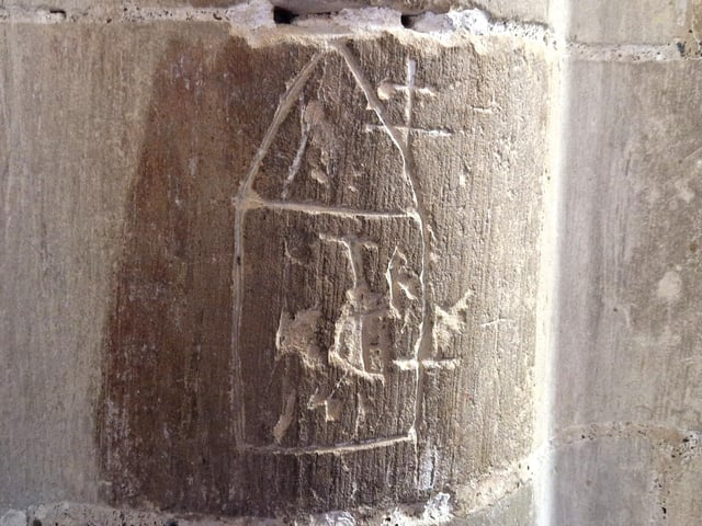 Puritan carvings in the Lady Chapel from 1660, showing the plain church as they thought it should be, without stained glass