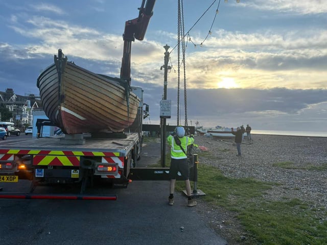 An historic clinker-built fishing boat was lowered down onto Worthing Beach ahead of restoration works.