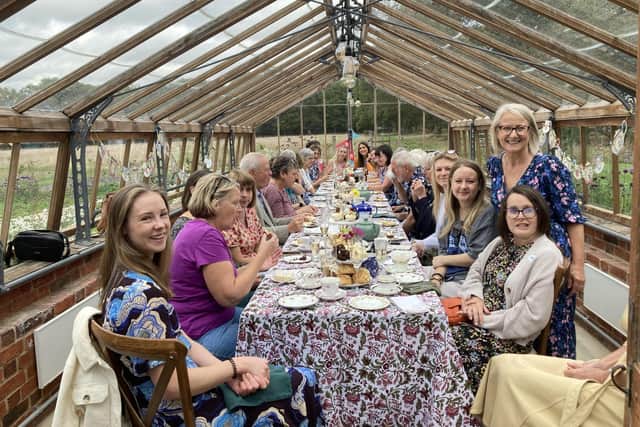 Chloe, right, hosted more than 30 people at Somersbury Barn’s Victorian glasshouse in Ewhurst as part of The Brain Tumour Charity's annual Big Bake campaign.Photo contributed