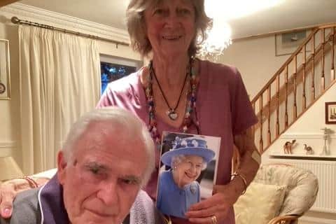 Joe and Terry Wilkins with their card from Her Majesty Queen Elizabeth II on Thursday, September 8