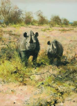 A detail of David Shepherd’s Rhinos in Namibia painted in 1999.