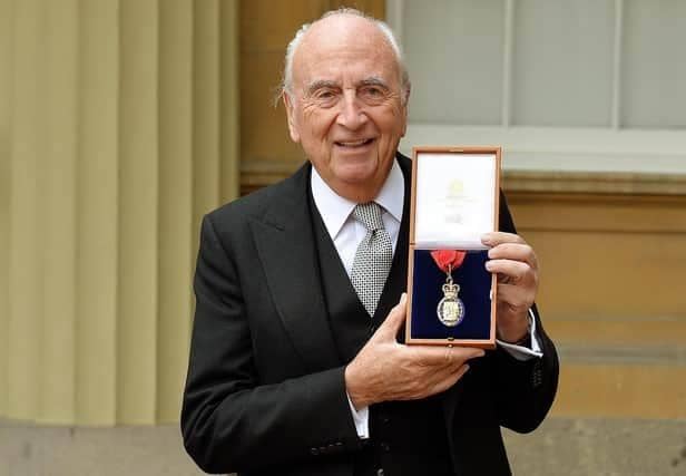 Lord Young of Graffham, David Young holds his insignia of member of the Order of the Companions of Honour after it was presented to him by the Prince of Wales in 2015 (Photo by John Stillwell - WPA Pool/Getty Images)