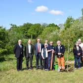 Deputy Lieutenant of East Sussex John Moore-Bick (second from right) with the Chairman and Directors of the K&ESR plus forestry and station volunteers at the tree planting at Bodiam