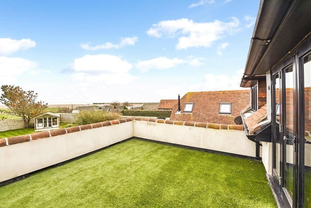 This £1,950,000 detached house is close to the beach and has four bedrooms, two receptions, a steam room and swimming pool and two Airbnb units.