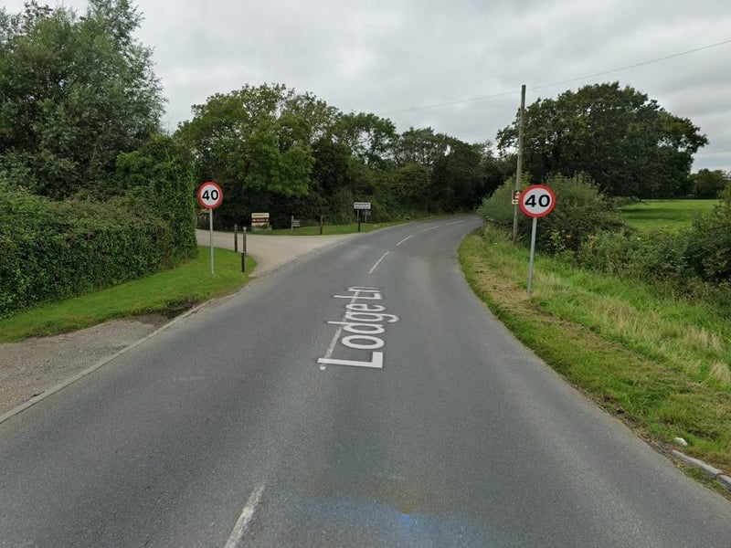 There is a large pothole in Lodge Lane, Hassocks, which is in line with car wheels.