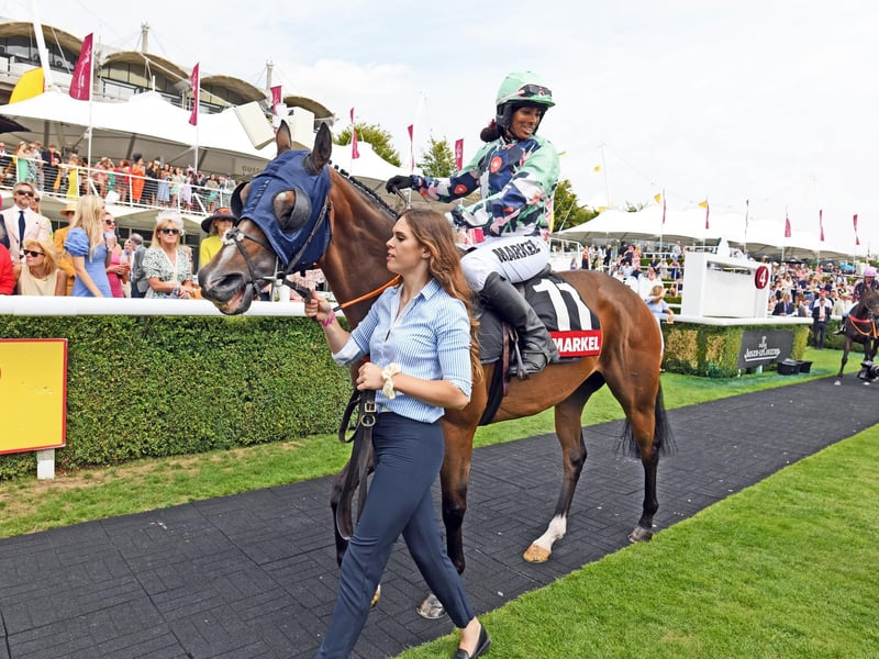 QATAR GOODWOOD THURSDAYGOODWOOD, CHICHESTERENGLANDJULY 28th 2022PHOTOGRAPHER: Malcolm Wells // NOTE: these are race results not necessarily who is in the picture //Meeting: QATAR GOODWOOD FESTIVAL MEETING THIRD DAYRace:The Markel Magnolia Cup - a charity race Time:1.10 pm1st: Dark Shot Jockey: Ashleigh WicheardIn The Parade Ring before going out on to the course Ashleigh Wicheard, who is a work rider for trainer Neil Mulholland, won the Markel Magnolia Cup charity race at the Qatar Goodwood Festival on Thursday showing great form on her horse 'Dark Shot' Picture: Malcolm Wells Professional Photographer E: malcolmrichardwells@gmail.com:Images from Ladies' Day at Glorious Goodwood - the Qatar Goodwood Festival - in 2022