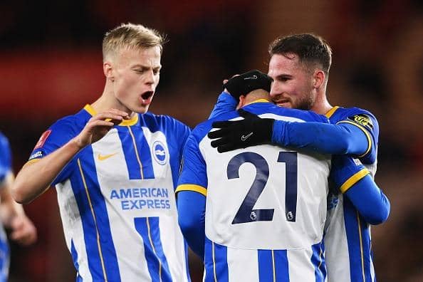 Deniz Undav of Brighton & Hove Albion celebrates with teammate Alexis Mac Allister after scoring the team's fifth goal during the Emirates FA Cup Third Round match at Middlesbrough