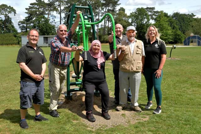 Crawley councillors and officers try out the outdoor fitness equipment