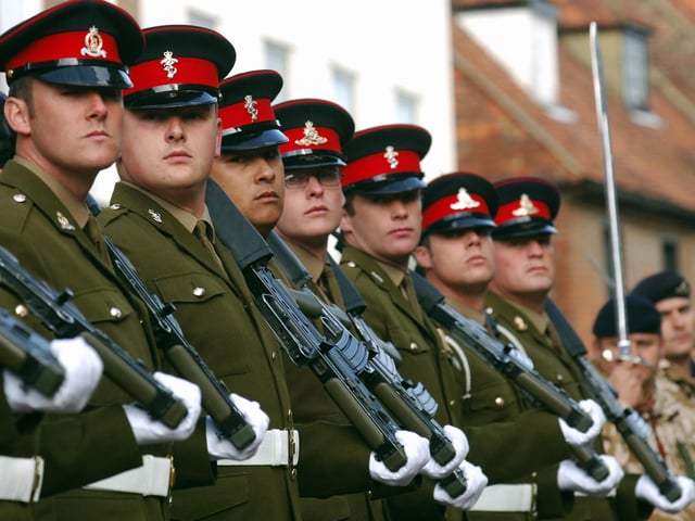 The regiment stops at the Council House to receive the Freedom of the City