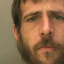 Lewis Stephenson, 33, is ‘wanted on warrant’ and for ‘failing to appear at court’. Picture courtesy of Sussex Police