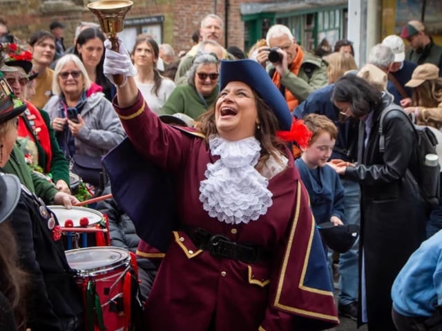 The old custom of scrambling for hot pennies in Rye