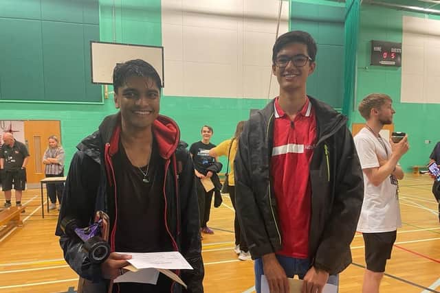 Students from The Sir Robert Woodard Academy collecting their results