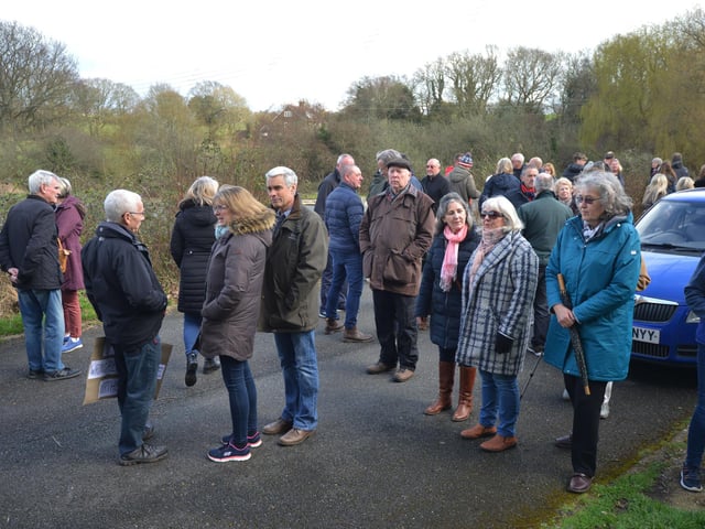 Public gathering by the gates of the Northeye site in Bexhill on Saturday April 1.