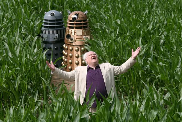 Actor Colin Baker who played the Sixth Doctor (1984-1986) with Daleks amongst a maize maze in the shape of a Dalek (Photo by Kippa Matthews/David Leon/Partners PR via Getty Images)
