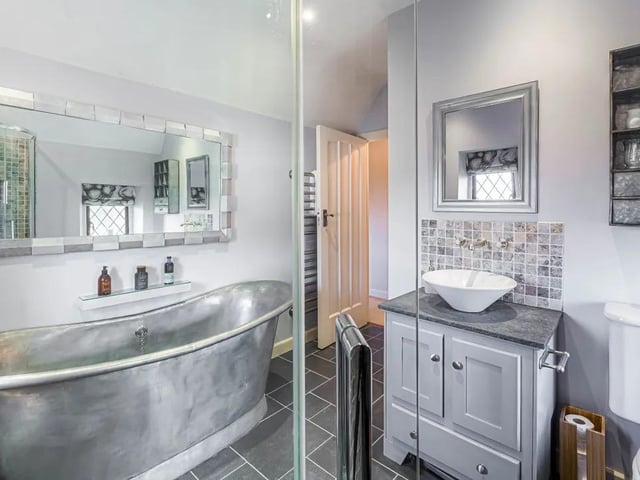 The free-standing bath gives the bathroom a real sense of character.