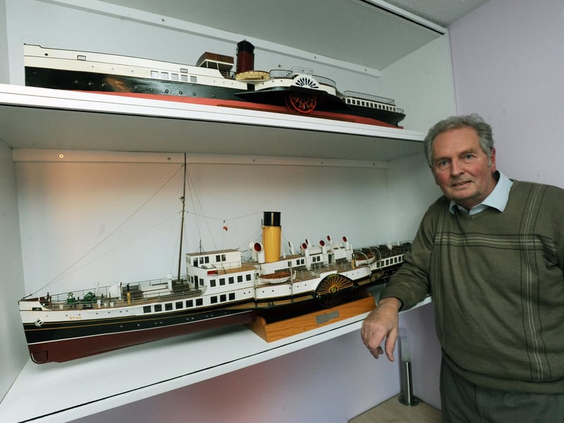Tony Horn with his collection of model ships