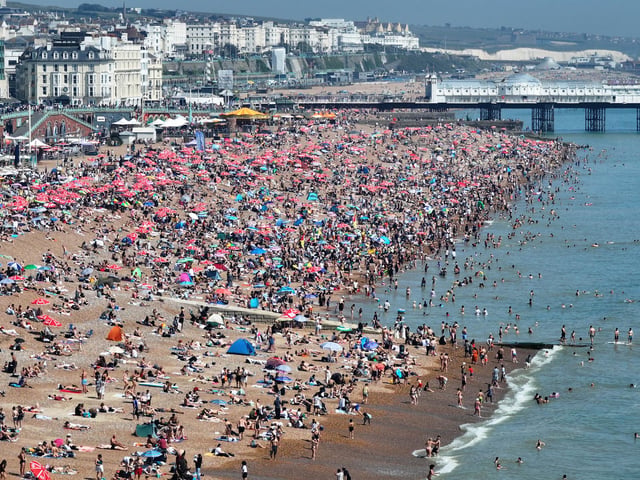 Families, groups of friends and tourists packed the seafront throughout the day, with many making the most of the sunshine by swimming in the sea, sunbathing, and queuing for ice creams and drinks along the promenade.