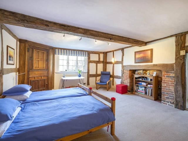 There are seven bedrooms and three bathrooms throughout the first and second floors