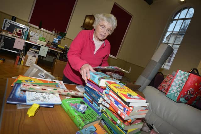 Surviving Christmas 2023 in Hastings on December 14: Packing and delivering hampers, and also sorting through the toys.