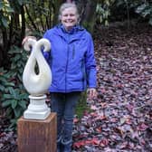 Bronwyn Sibley with her sculpture 'Having Each Other's Back